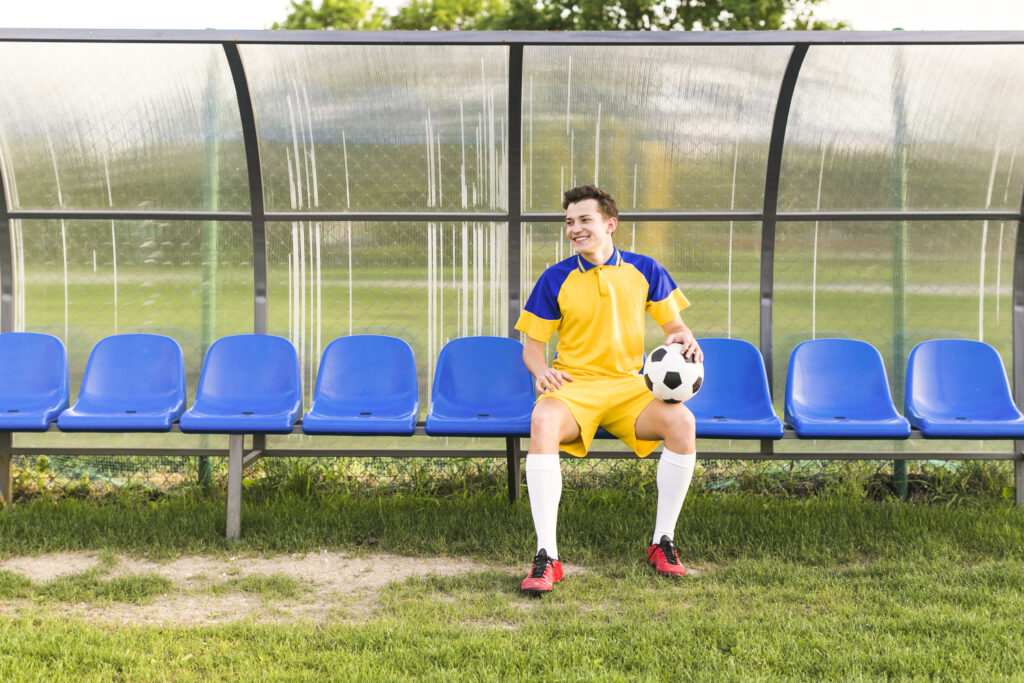 amateur-football-concept-with-man-bench